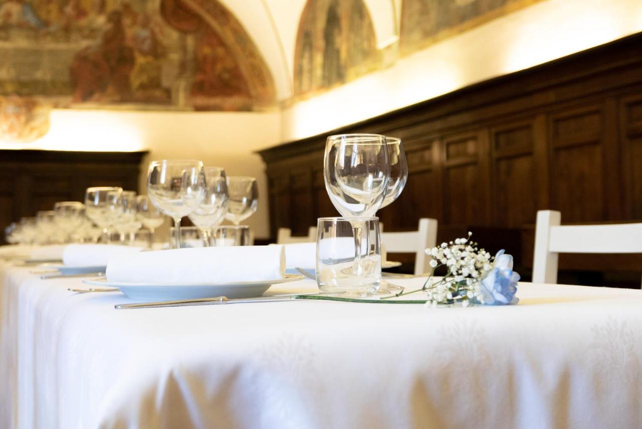 Monastero Ss. Annunziata Hotel Todi Exterior foto A table set for a meal
