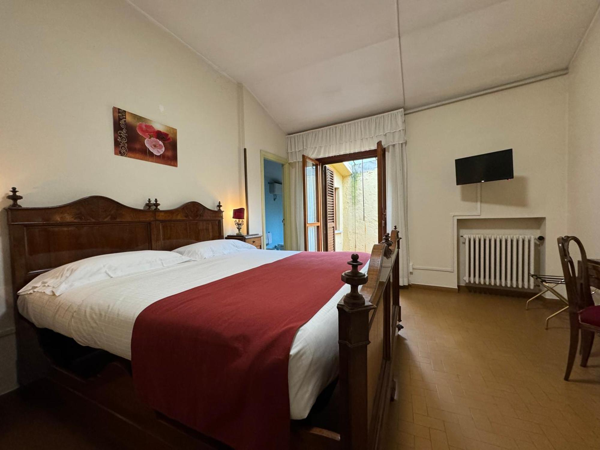 Monastero Ss. Annunziata Hotel Todi Exterior foto A room at the hotel