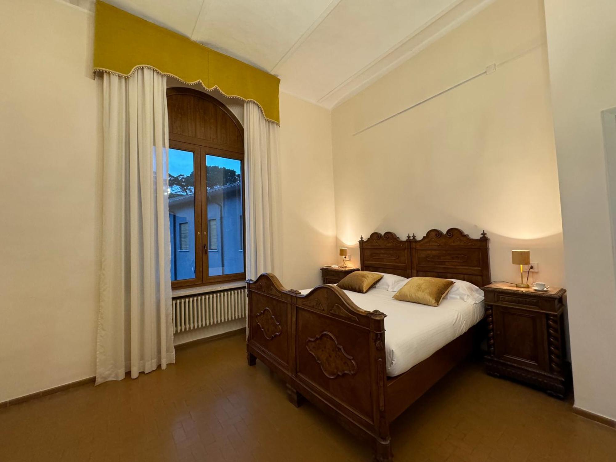 Monastero Ss. Annunziata Hotel Todi Exterior foto A room at the hotel